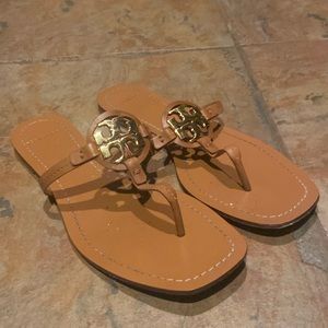 Beautiful Tory Burch medallion flip flop sandals. Tan neutral color, leather.